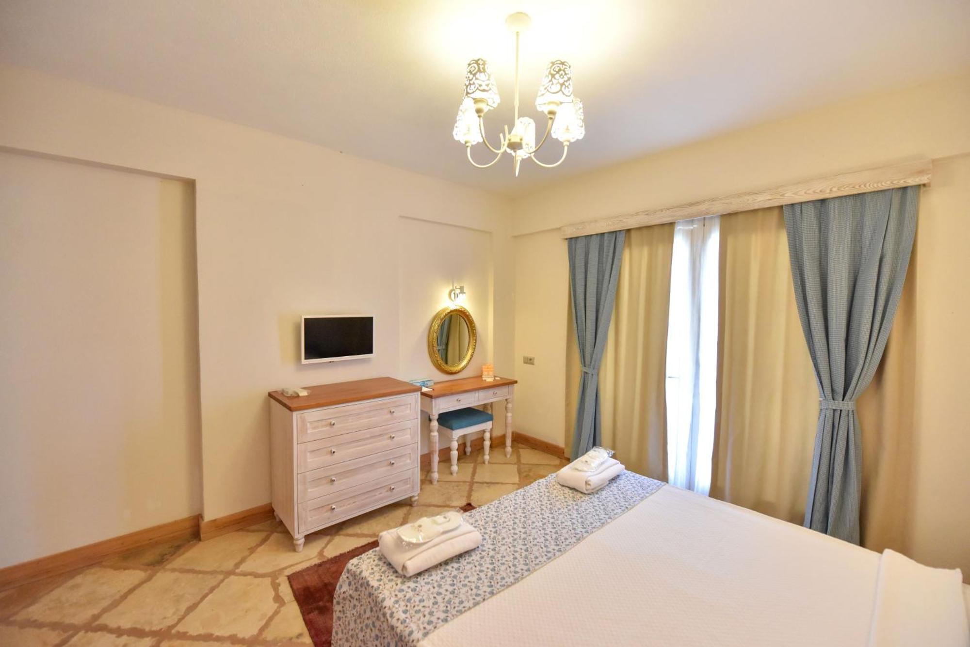 Orino Suites Cedit Habitación foto